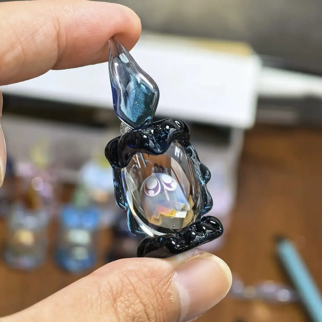 Black ghost candle glass figurine close up