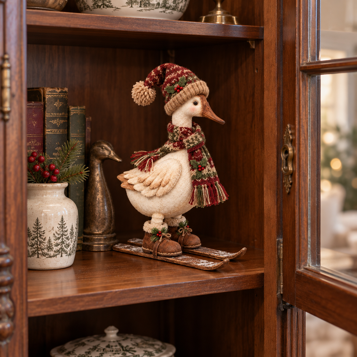 Vintage Christmas Skiing Goose displayed in antique cabinet