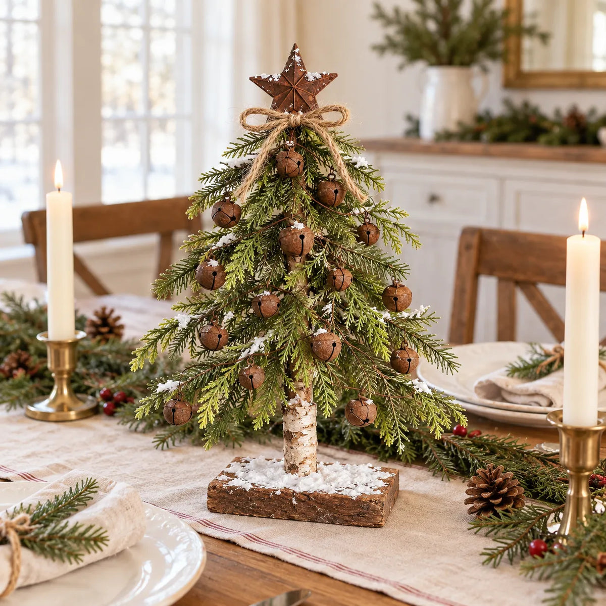 Snow-Kissed Bell and Star Christmas Tree on a cozy holiday dining table