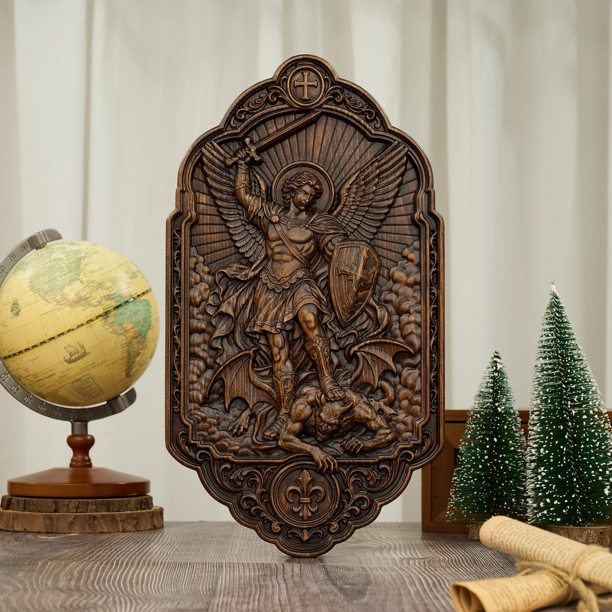 Dark wood St. Michael the Archangel wall plaque displayed with classic decorative objects and a neutral backdrop